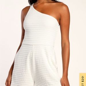 Lulu’s Love and Fun Ivory Smocked One-Shoulder Romper.